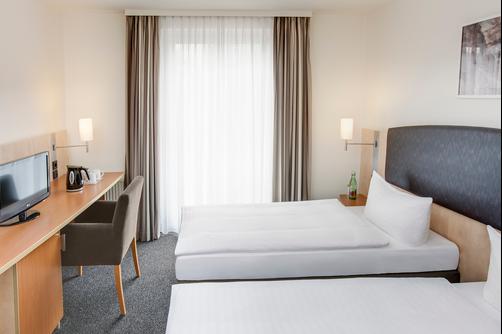 InterCityHotel Wien - Viena - Quarto