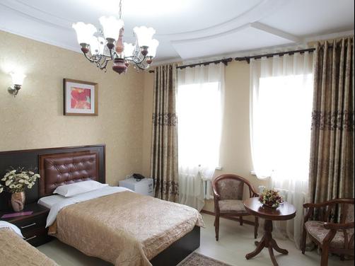 Grand Hotel - Bishkek - Quarto