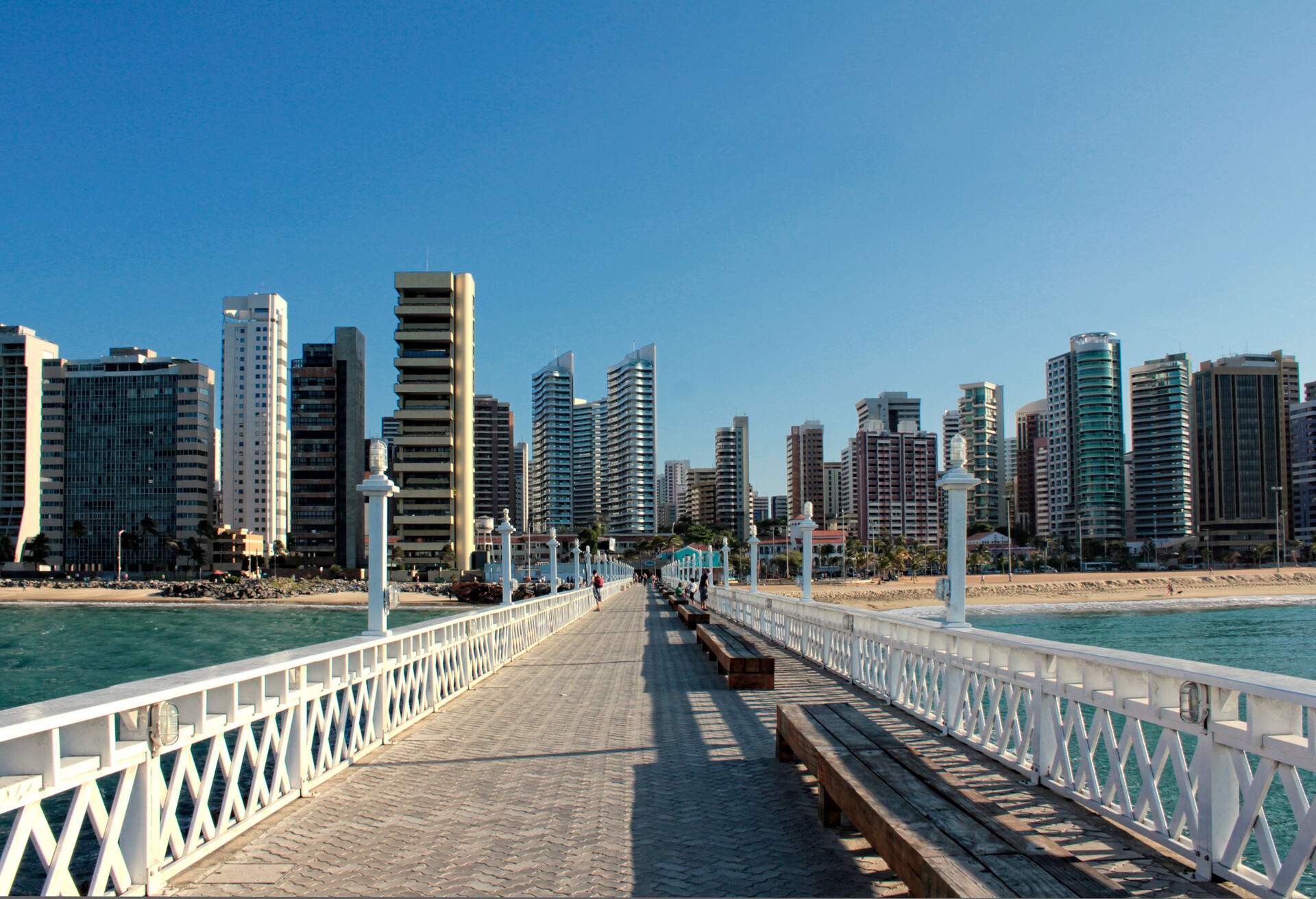 Pier of Iracema beach with skyline in background, Fortaleza, Ceará, Brazil.