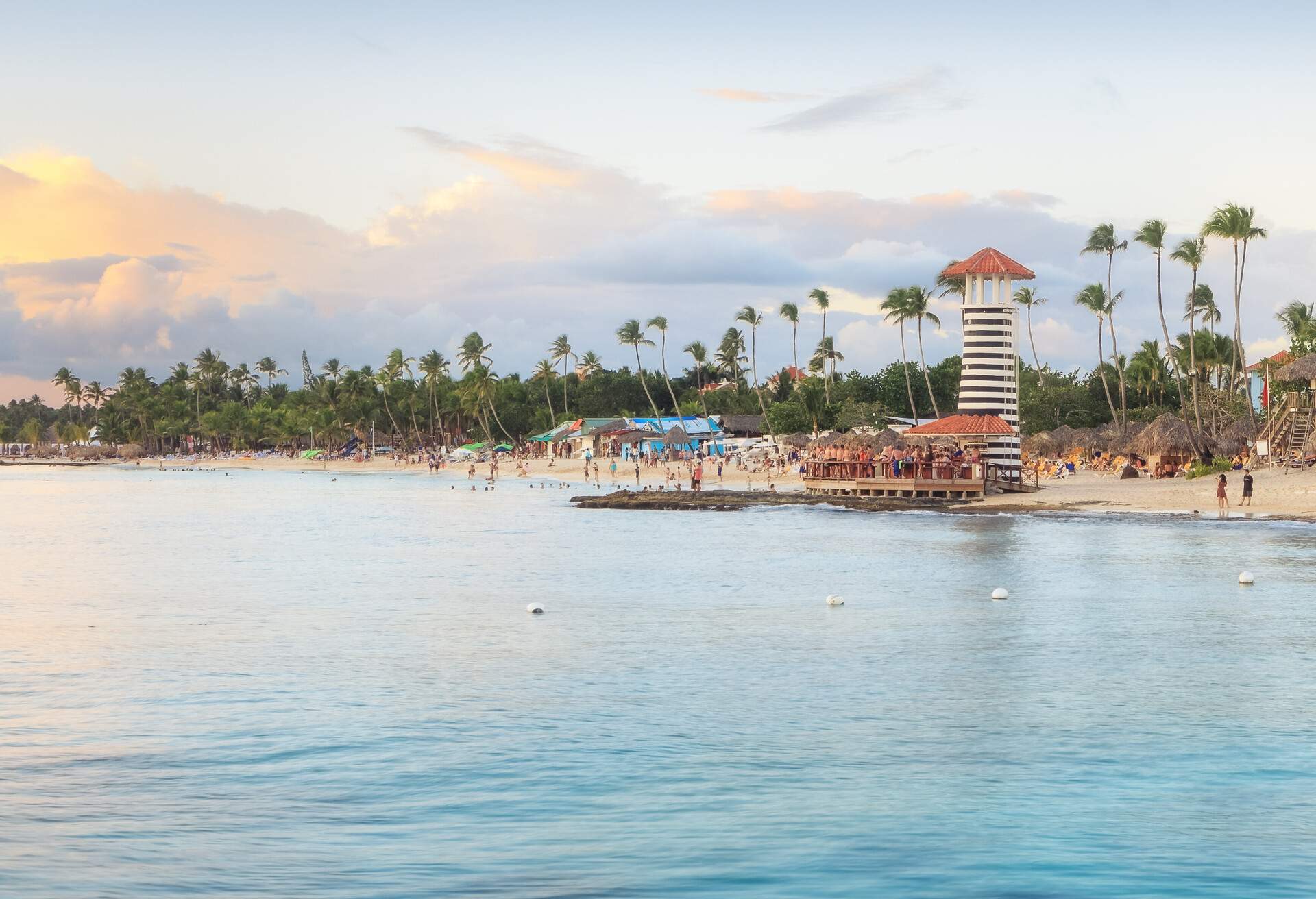 Panorama of sunset at Bayahibe beach, La Romana, Dominican republic; Shutterstock ID 1104873917; Purpose: Destiny; Brand (KAYAK, Momondo, Any): Any