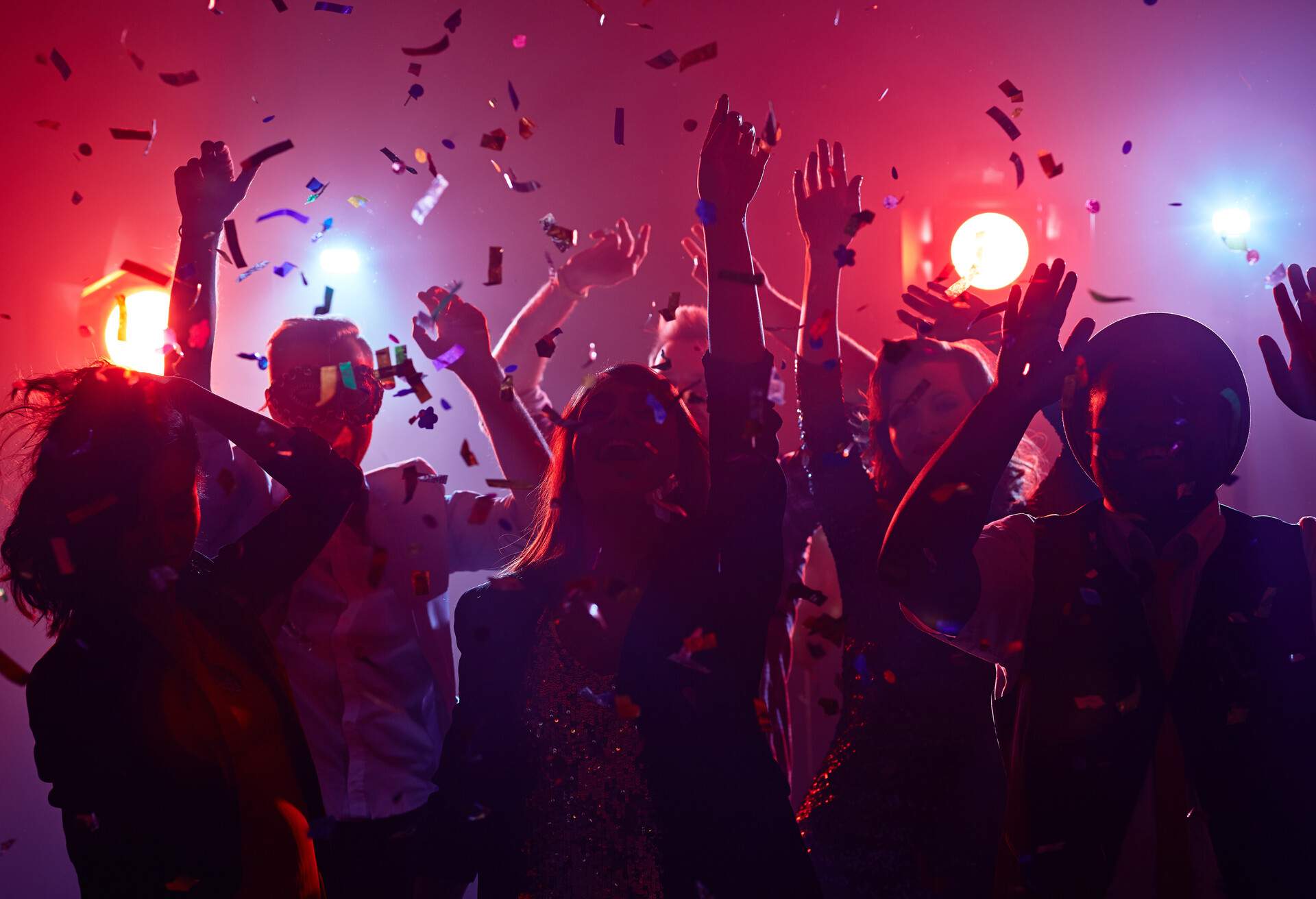 Young people dancing in night club