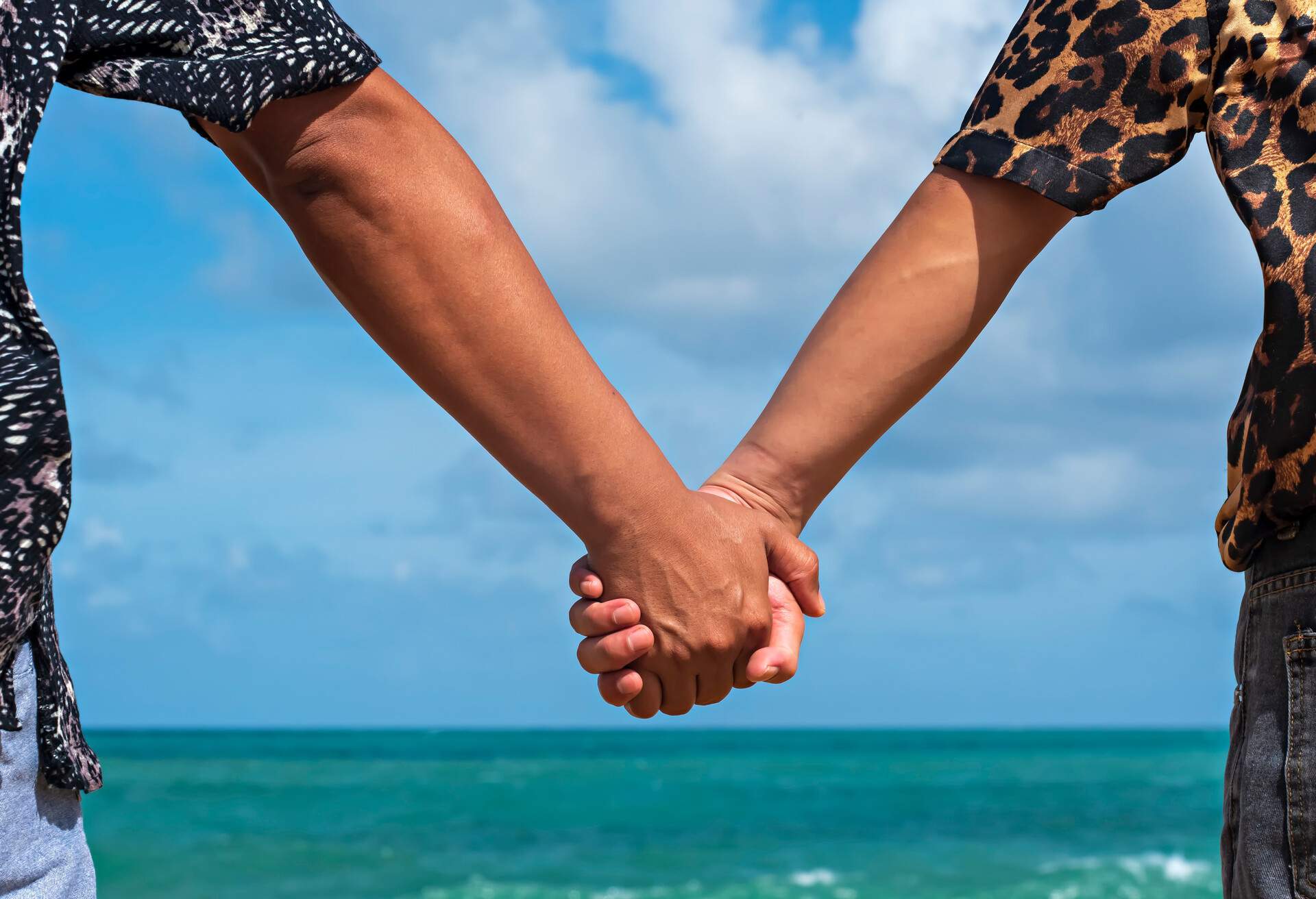 gay couple on the beach