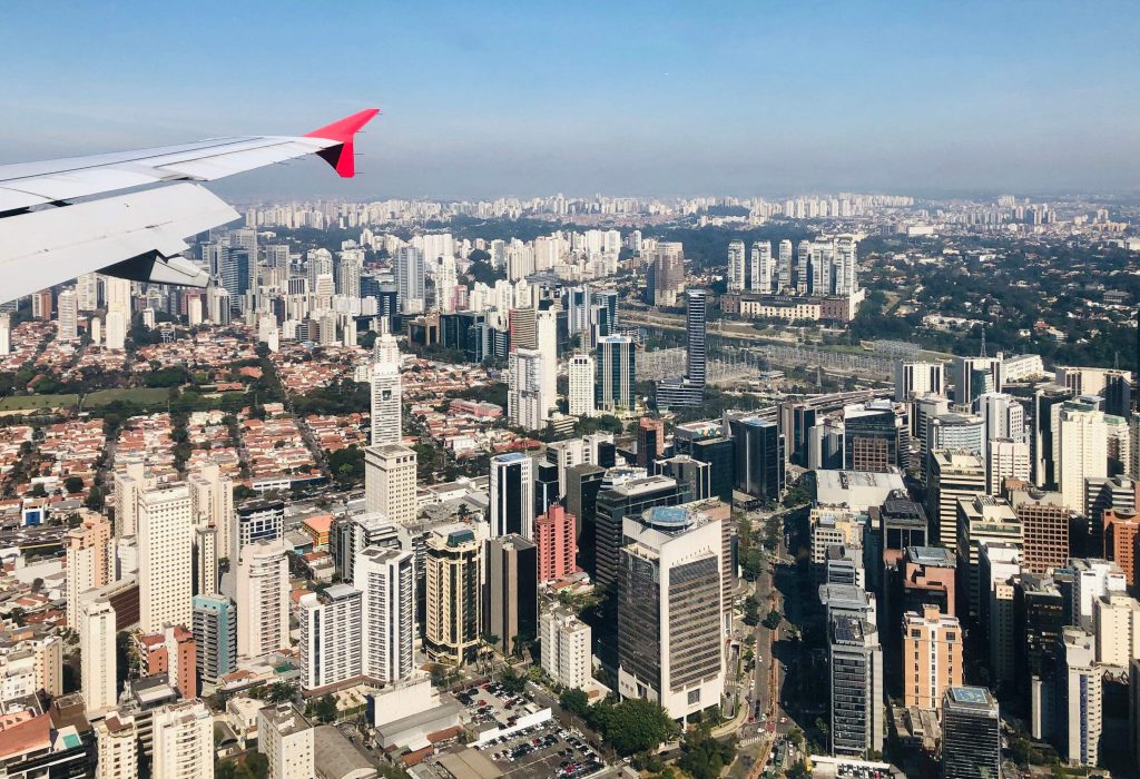 Urban landscape of a highly urbanised city as seen from an airplane.