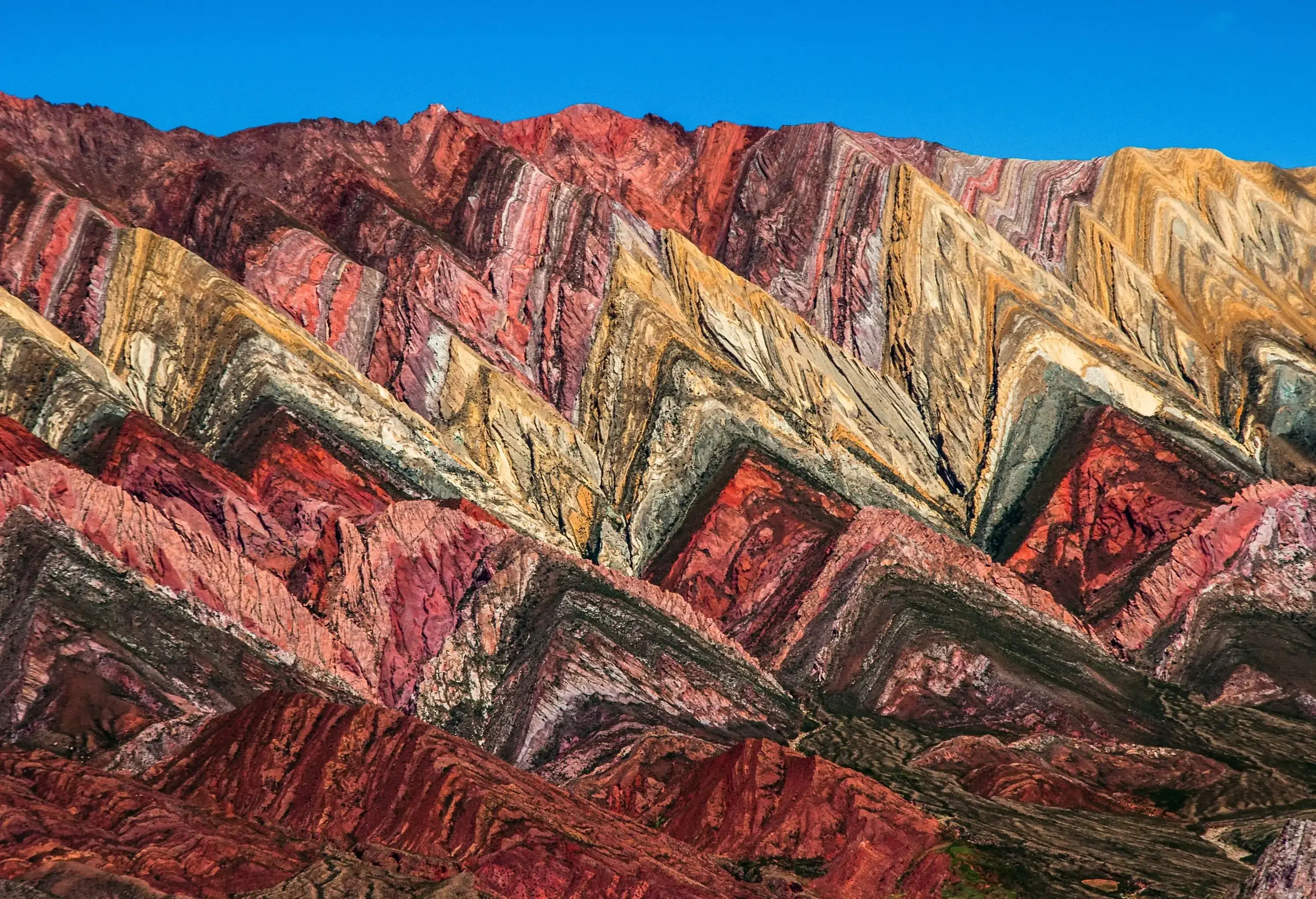 Mesmerizing and colourful rock formations resembling a picturesque painting in Quebrada de Humahuaca, Salta, Argentina.