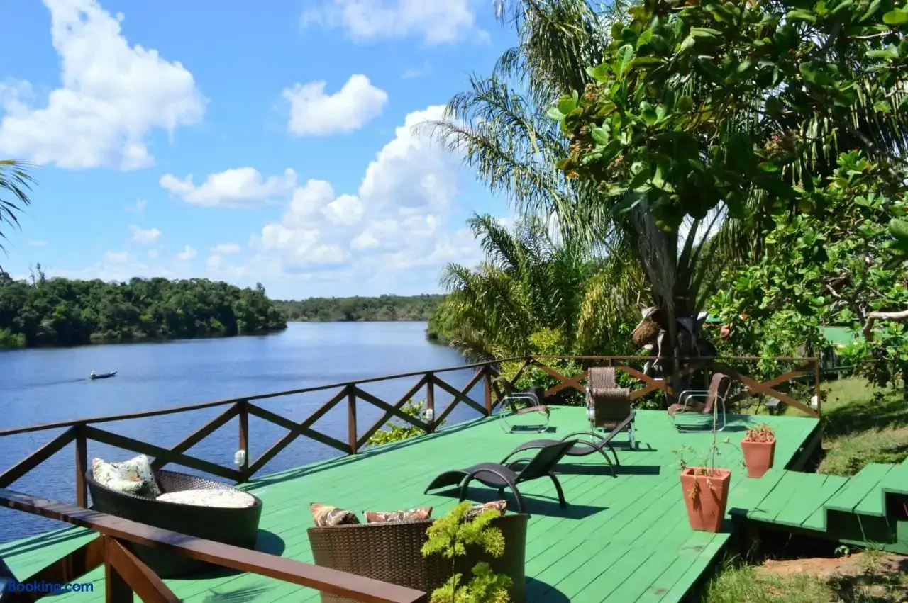 Deck with chairs by the Amazon river