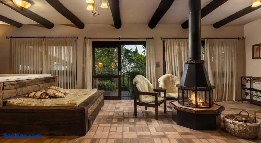 Country hotel room with fireplace in the room