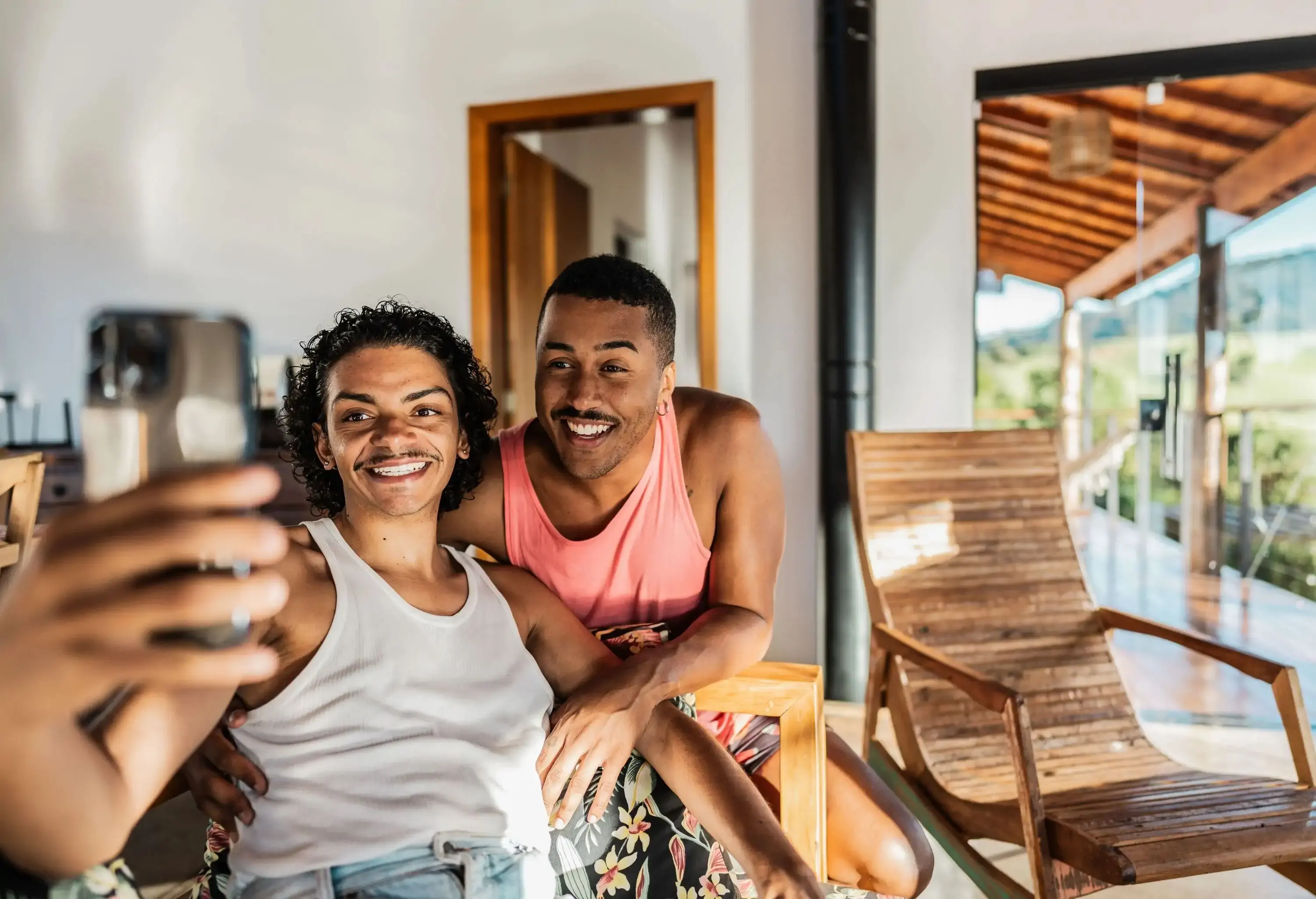 Young couple taking a selfie or filming at an inn