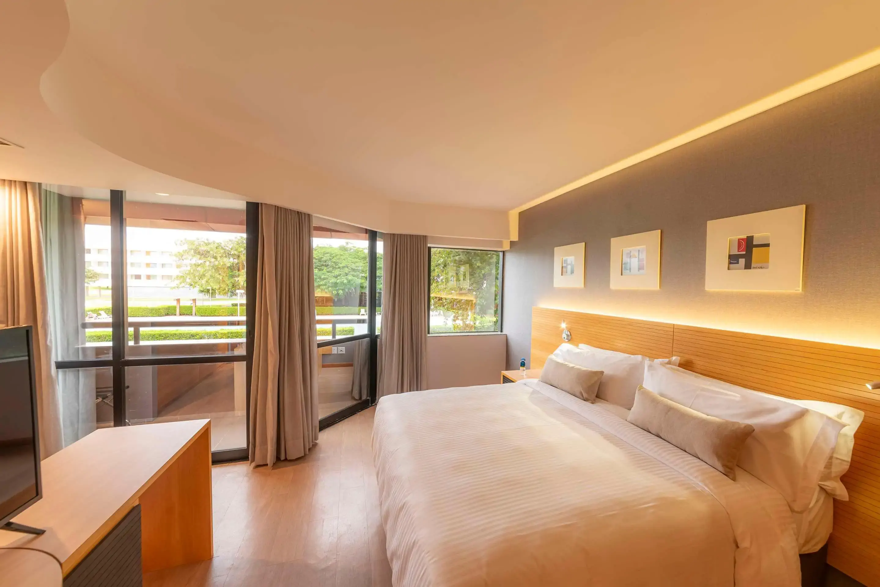 Elegant hotel room with view over a garden
